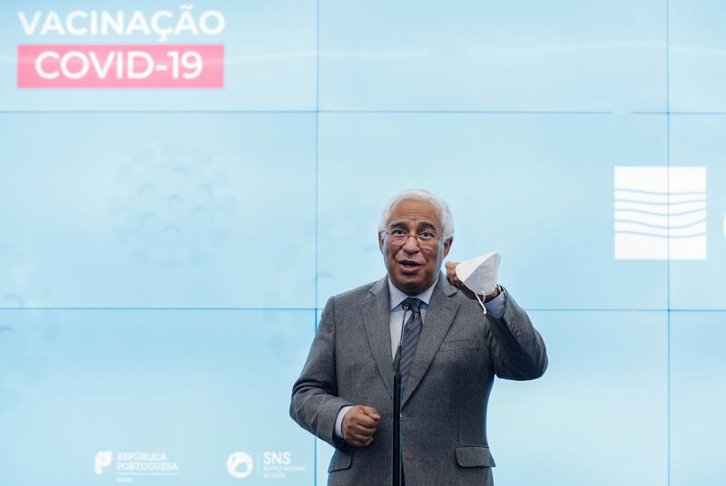 Portuguese Prime Minister António Costa addresses journalists at the end of a visit to a hospital where health care workers were being vaccinated against Covid-19, in Lisbon, Portugal. AP