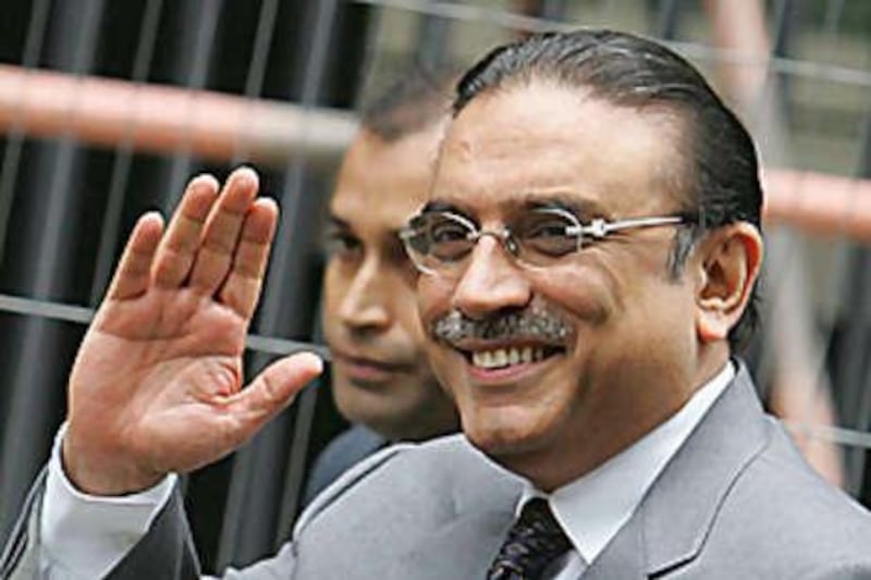 The Pakistan president, Asif Ali Zardari, waves as he arrives at 10 Downing Street in London, on Sept 16 2008, for a meeting with the British prime minister, Gordon Brown.