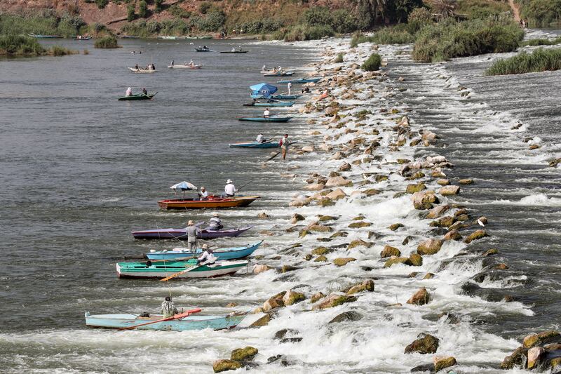 People row on the Nile during hot weather in the Qanater, on the outskirts of Cairo. EPA