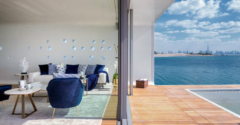 The living room opens out on to a terrace, with Dubai skyline views. Courtesy The Heart of Europe