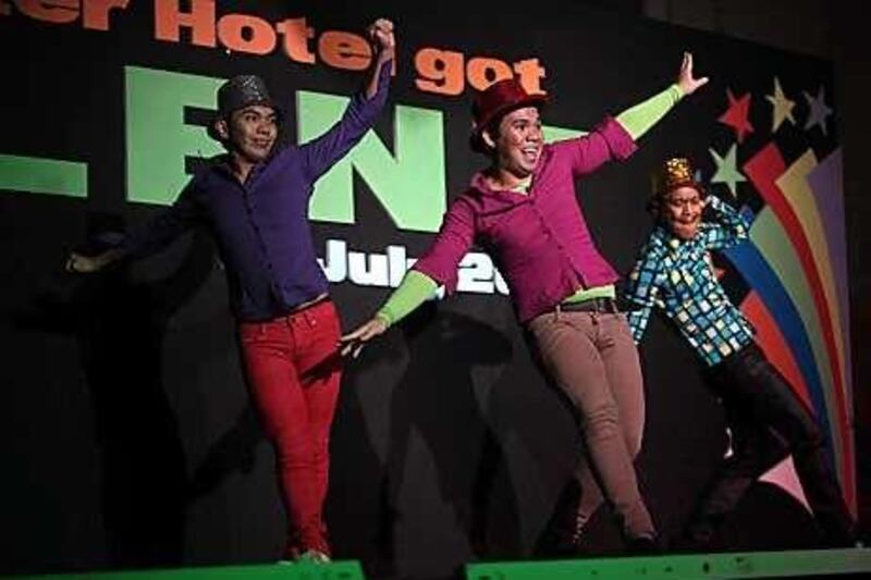 Three hotel workers perform at the Inter-Hotel Got Talent competition at the Sheraton in Abu Dhabi.