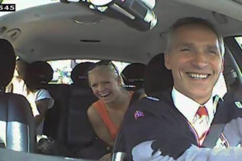 Norwegian Prime Minister Jens Stoltenberg (right) acting as a taxi driver in Oslo as a part of the election campaign for the Norwegian Labour Party.