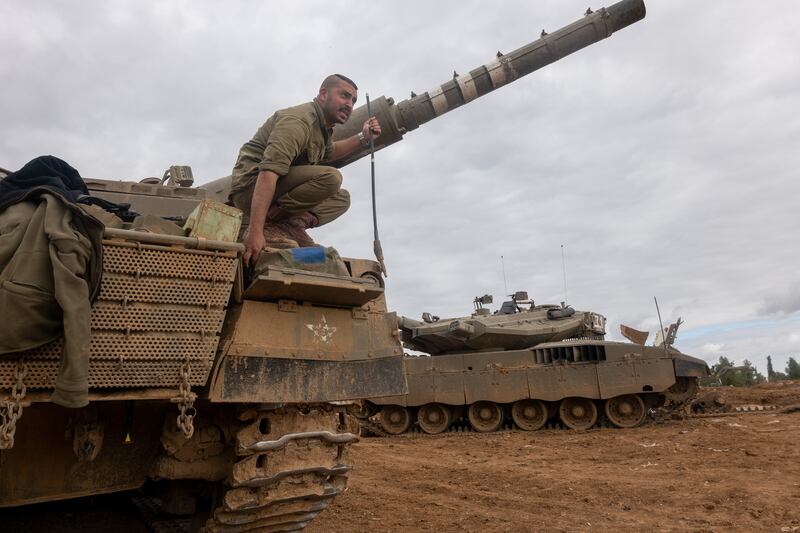 Israeli tanks outside the city of Sderot, near the border with Gaza. Getty Images