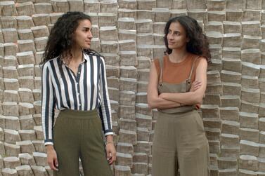 The sisters Tessa and Tara Sakhi in front of their work Letters from Beirut in the Giardini in Venice. The work gives a voice to those in Lebanon.