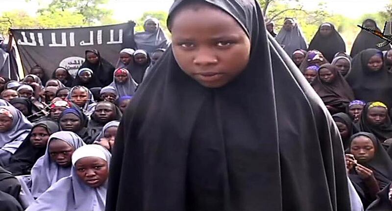 A Boko Haram video showed some of the girls reciting Quranic verses in Arabic and two of them explaining why they had converted from Christianity to Islam while in captivity. AFP Photo