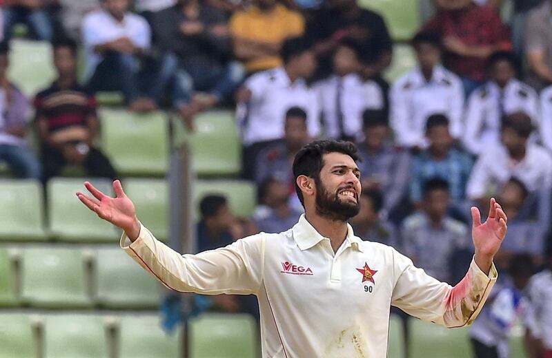 Zimbabwe cricketer Sikandar Raza reacts during the fourth day of the first Test cricket match between Bangladesh and Zimbabwe in Sylhet on November 6, 2018. (Photo by MUNIR UZ ZAMAN / AFP)