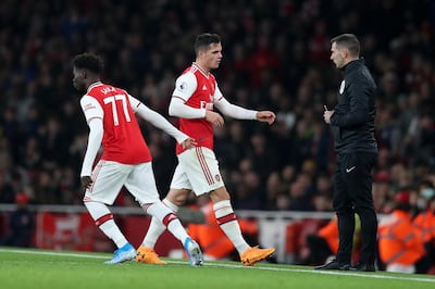 LONDON, ENGLAND - OCTOBER 27: Granit Xhaka of Arsenal is substituted off for Bukayo Saka of Arsenal during the Premier League match between Arsenal FC and Crystal Palace at Emirates Stadium on October 27, 2019 in London, United Kingdom. (Photo by Alex Morton/Getty Images)