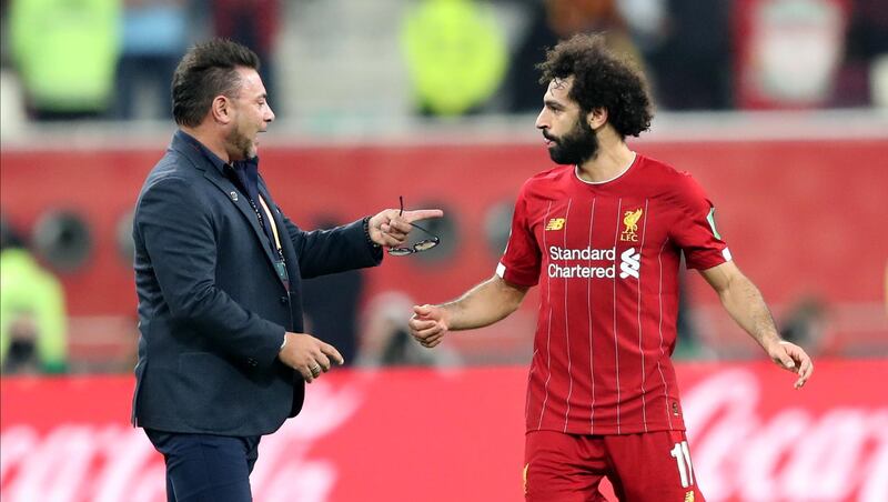 Antonio Mohamed, head coach of Monterrey, talks with Mohamed Salah after the match. EPA