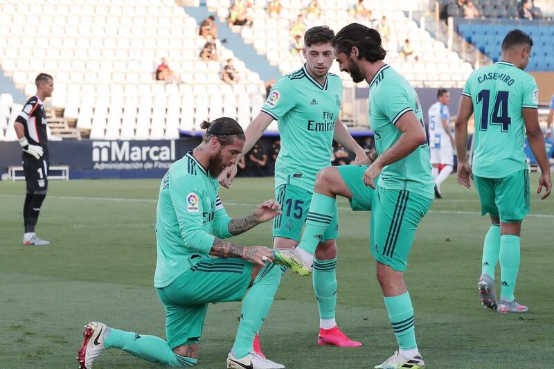 Sergio Ramos celebrates Real's first goal with teammate Isco. Getty