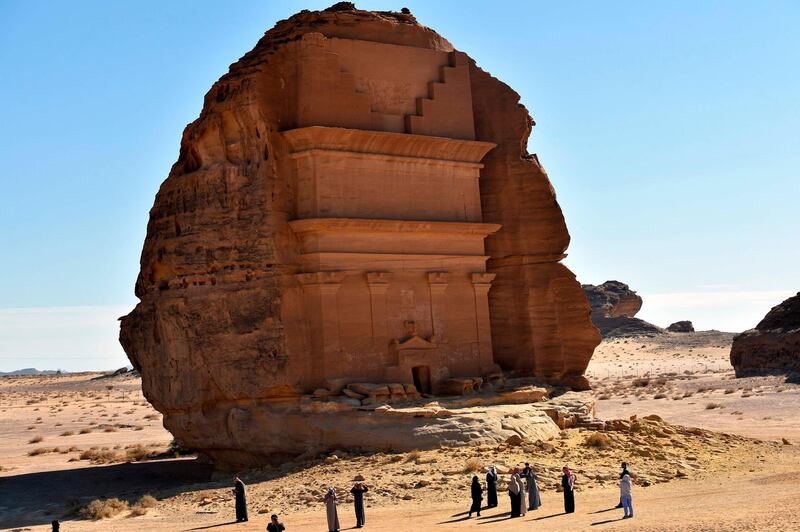 Tourists visit the Qasr al-Farid tomb (The Lonely Castle) in Madain Saleh, Saudi Arabia. AFP