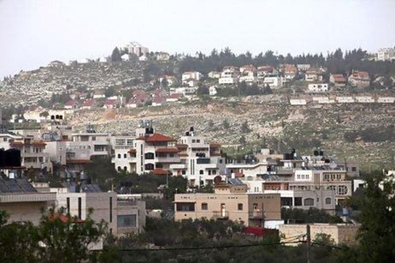 The West Bank village of Turmus'ayya with the Israeli settlement of Shilo located partly on Palestinian land shown in the background.