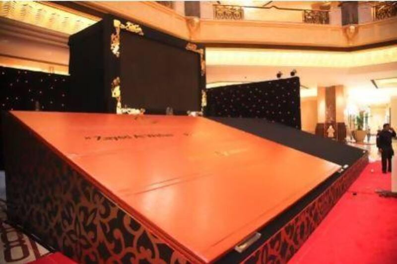 The world's largest photo album is in the process of being set up inside the atrium of the Emirates Palace. Seen here is the yet to be completed installation. Lee Hoagland / The National