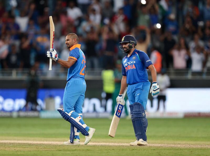 Dubai, United Arab Emirates - September 23, 2018: India's Shikhar Dhawan makes 100 during the game between India and Pakistan in the Asia cup. Sunday, September 23rd, 2018 at Sports City, Dubai. Chris Whiteoak / The National