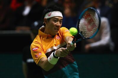 ROTTERDAM, NETHERLANDS - FEBRUARY 16:  Kei Nishikori of Japan returns a backhand to Stan Wawrinka of Switzerland in their semi final match during Day 6 of the ABN AMRO World Tennis Tournament at Rotterdam Ahoy on February 16, 2019 in Rotterdam, Netherlands. (Photo by Dean Mouhtaropoulos/Getty Images)