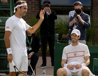 Roger Federer (SUI) and Andy Murray (GBR) on Court 14 for a practice session at The All England Lawn Tennis and Croquet Club. Picture date: Friday June 25, 2021. PA Photo. Photo credit should read: AELTC/David Gray/PA Wire. RESTRICTIONS: Use subject to restrictions. Editorial use only, no commercial use without prior consent from rights holder.