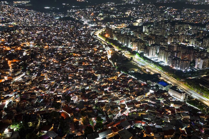 Houses cover a hillside in the Petare neighbourhood of Caracas, Venezuela. The world's population hit an estimated eight billion people on November 15, according to the United Nations. AP