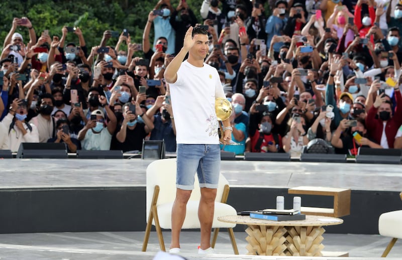 Football superstar Cristiano Ronaldo greets fans before a Q&A session for Expo 2020 Dubai's  Health and Wellness Week at Al Wasl Plaza. All Photos: Pawan Singh / The National