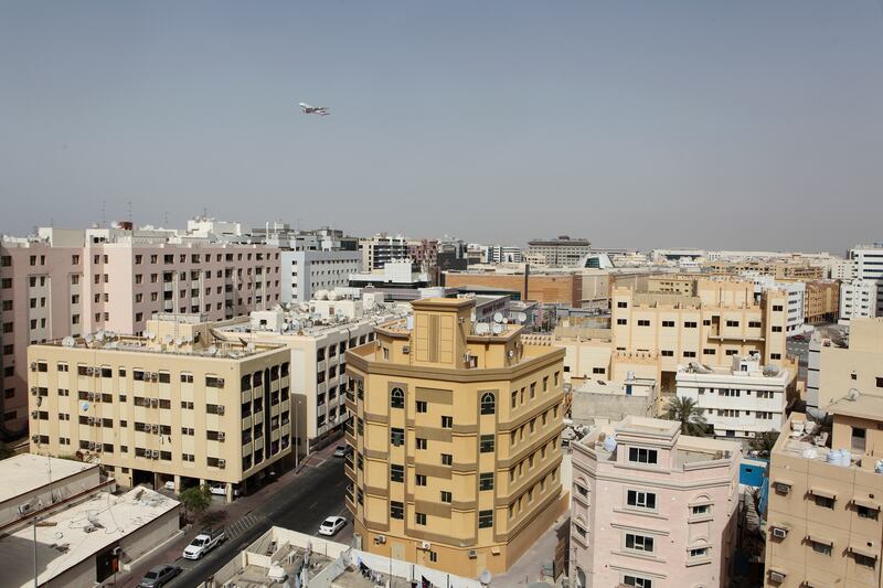 DUBAI, UAE. April 19, 2015 - Stock photograph of a plane flying over the Al Muraqqabat area in Deira in Dubai, April 19, 2015. (Photos by: Sarah Dea/The National, Story by: Standalone, Stock)
 *** Local Caption ***  SDEA190415-deira_stock10.JPG