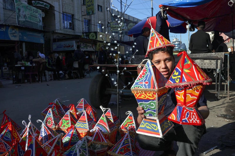 A Palestinian street vendor sells traditional 'fanous' lanterns in Rafah. AFP