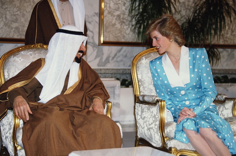 Emir Jaber III of Kuwait gives an audience to Princess Diana at the Bayan Palace, in March 1989. The princess is wearing a Catherine Walker dress.