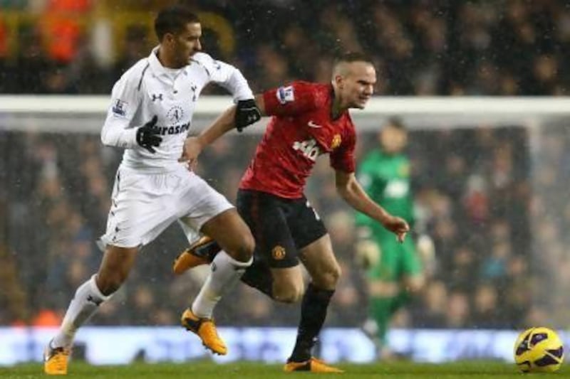 Manchester United's Tom Cleverley and Tottenham's Kyle Naughton battle for the ball. Clive Mason / Getty Images