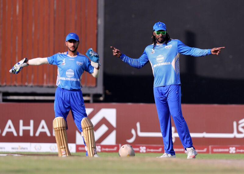 Sharjah, United Arab Emirates - October 18, 2018: Chris Gayle (R) and Ikram Ali Khil of the Balkh Legends during the game between Kandahar Knights and Balkh Legends in the Afghanistan Premier League. Thursday, October 18th, 2018 at Sharjah Cricket Stadium, Sharjah. Chris Whiteoak / The National