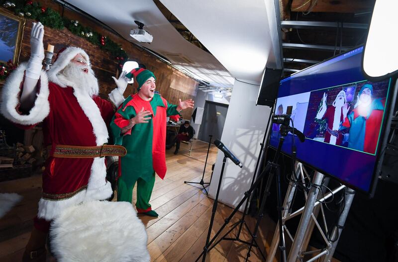 Santa Claus talks to children on Zoom in Newquay, England. A new partnership between Santa Claus and the Children's Hospice South West sees Santa meeting with children right across the country via Zoom. Getty Images