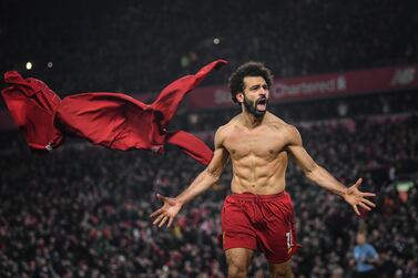 LDY Agency: Barclays Shot of the Century: The Premier League's greatest pictures. 

Pictured: Mohammed Salah of Liverpool celebrates scoring against Manchester United in front of the Kop at Anfield. 19/01/2020. Copyright: Michael Regan

Football's greatest moments in recent memory have been brought together in a gallery of Iconic images as 20 years of Barclays involvement in the Premier League is celebrated with photographic competition, Shot Of The Century.

Copy and competition information: https://lowerblock.com/articles/shot-of-the-century-the-premier-leagues-greatest-pictures/
