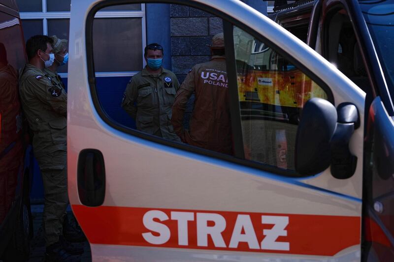 Polish Search and Rescue Firefighters prepare to leave with aid to Beirut, in Warsaw, Poland.  EPA