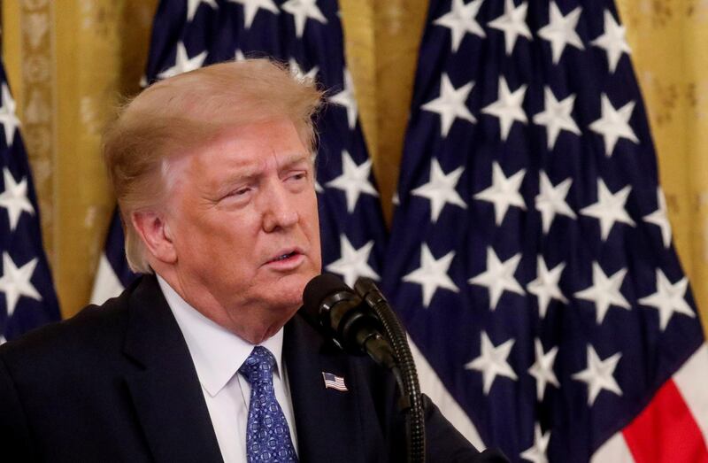 FILE PHOTO: U.S. President Donald Trump speaks about sending federal law enforcement agents to several U.S. cities to assist local police in combating what the Justice Department has described as a "surge" of violent crime, in the East Room at the White House in Washington, U.S., July 22, 2020. REUTERS/Leah Millis/File Photo