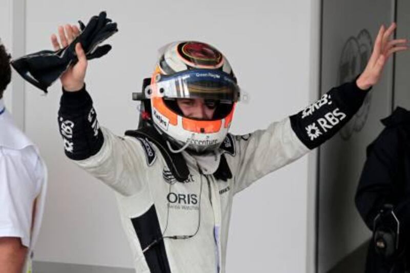 Williams Formula One driver Nico Hulkenberg of Germany gestures after winning the qualifying session of the Brazilian F1 Grand Prix race at Interlagos racetrack in Sao Paulo, November 6, 2010.  REUTERS/Paulo Whitaker (BRAZIL - Tags: SPORT MOTOR RACING) *** Local Caption ***  SAO55_MOTOR-RACING-_1106_11.JPG