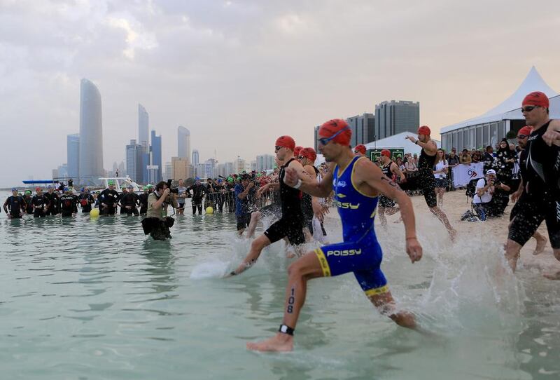 The Abu Dhabi International Triathlon  on the Corniche, above, will be replaced by a new event in March next year offering competitors a choice of three race distances.  Ravindranath K / The National