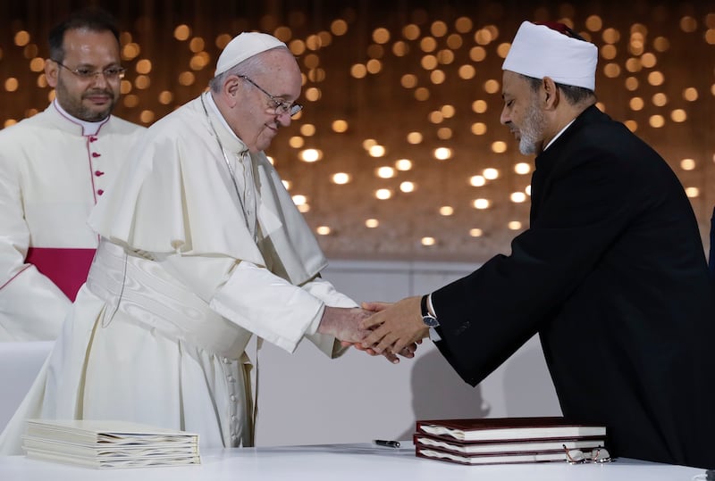 Pope Francis greets Dr Ahmad Al Tayeb, the Grand Imam of Al Azhar, after an inter-religious meeting at the Founder's Memorial in Abu Dhabi in February, 2019. AP