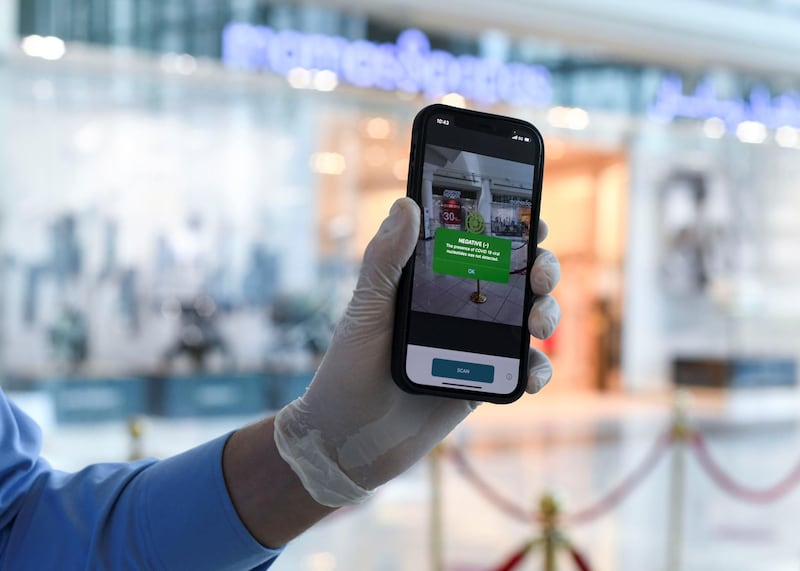 Face Scanning Detection-AD  New protocol of face scanning detection on the hand held device at Al Wahda Mall in Abu Dhabi on June 28, 2021. Khushnum Bhandari/ The National
Reporter: N/A News