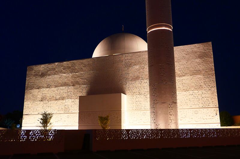 Lighting emphasises the modern design of the Mohammed Abdulkhaliq Gargash Masjid.