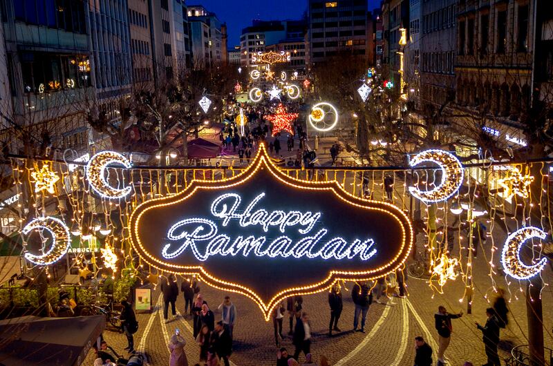 A Ramadan sign is illuminated to mark the beginning of the holy month in Frankfurt, Germany. AP