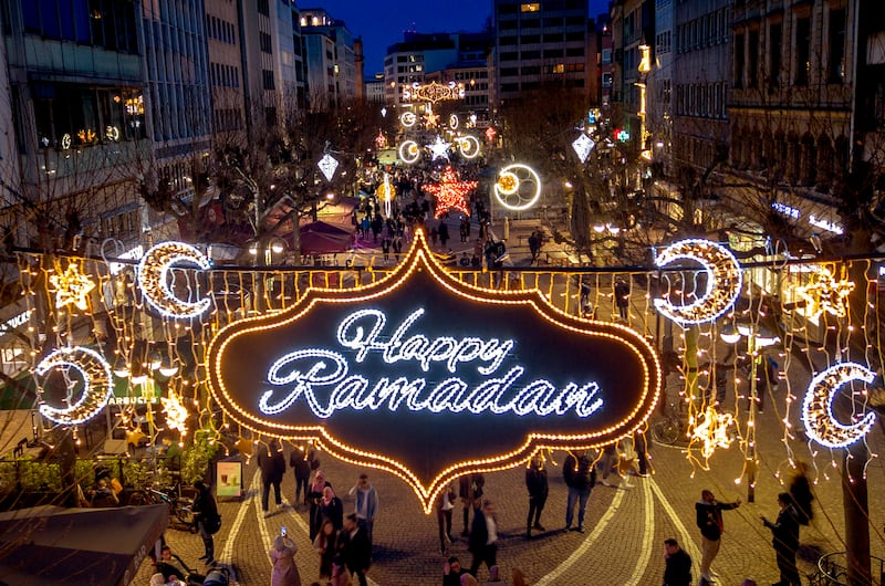 A Ramadan sign is illuminated to mark the beginning of the holy month in Frankfurt, Germany. AP