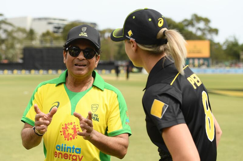 Sachin Tendulkar with Ellyse Perry during the Bushfire Cricket Bash at the Junction Oval in Melbourne. Getty Images