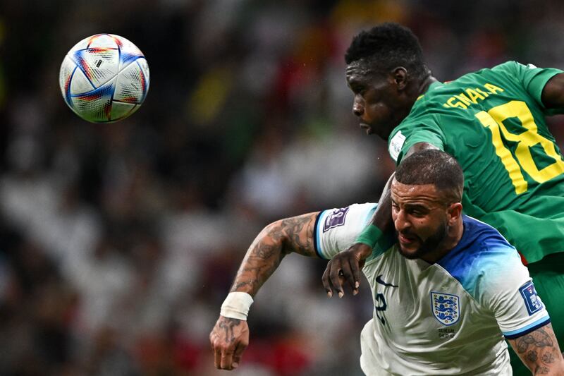 Kyle Walker 7 - Lucky not to be booked for a foul on Sarr after 36. The whole defence was pressured by Senegal, but it all changed after the opening goal. 

AFP
