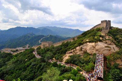 Sightseeing costs are included in the fare, with trips to places like the Great Wall of China on the itinerary. Unsplash