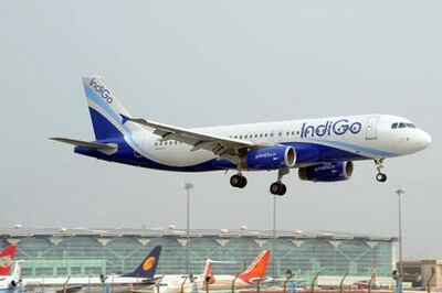 (FILE) - A file picture shows an IndiGo Airbus A320 aircraft landing at the Indira Gandhi International Airport in New Delhi on June 24, 2010. Indian airline IndiGo has signed an agreement to buy 180 Airbus A320 single-aisle aircraft in a record sale worth $16.4 billion (12.6 billion euros), the European plane maker said on January 11, 2011. AFP PHOTO/RAVEENDRAN