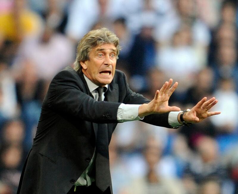 Real Madrid's Chilean coach Manuel Pellegrini reacts during the Spanish league football match Real Madrid against Osasuna at the Santiago Bernabeu stadium in Madrid, on May 02, 2010.  AFP PHOTO/DOMINIQUE FAGET