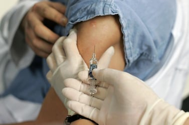 A new home flu vaccination service is being promoted in Abu Dhabi. Getty Images