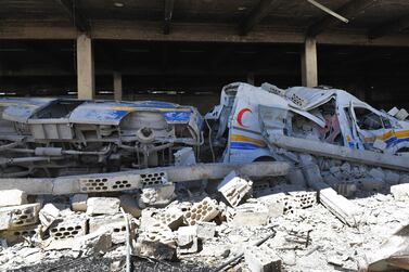 Destroyed ambulances and vehicles of the Syrian Civil Defence, also known as "The White Helmets" at their captured former headquarters in the town of Qalaat Al Madiq, some 45 kilometres northwest of the central city of Hama. AFP