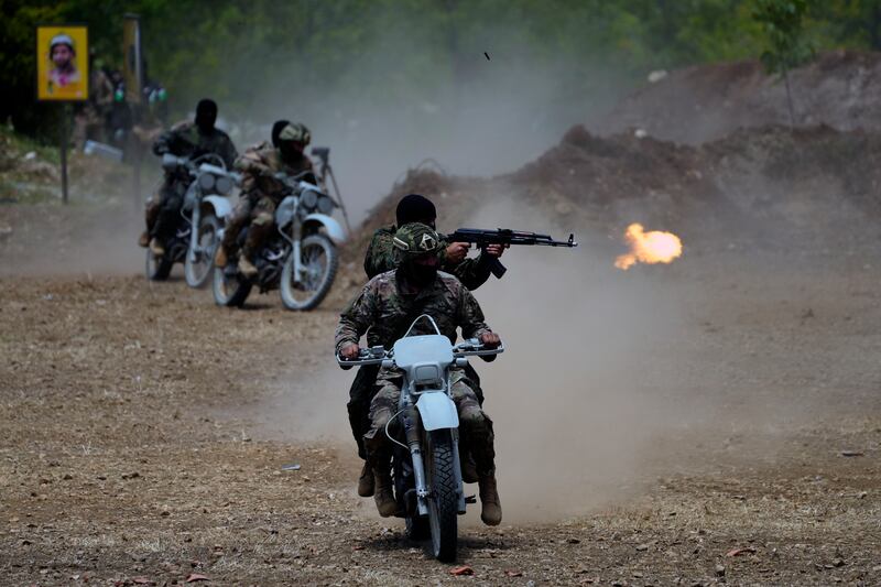 Fighters on motorbikes at the show of strength on Resistance and Liberation Day, which commemorates an Israeli withdrawal from southern Lebanon in 2000. AP 