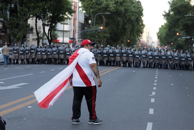 A fan of River Plate after the match was postponed. Reuters