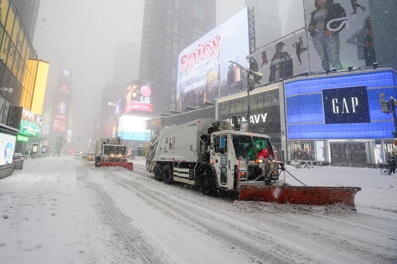 A snowplough removes snow from the Times Square during a snow storm, amid the coronavirus disease pandemic, in the Manhattan borough of New York City. Reuters