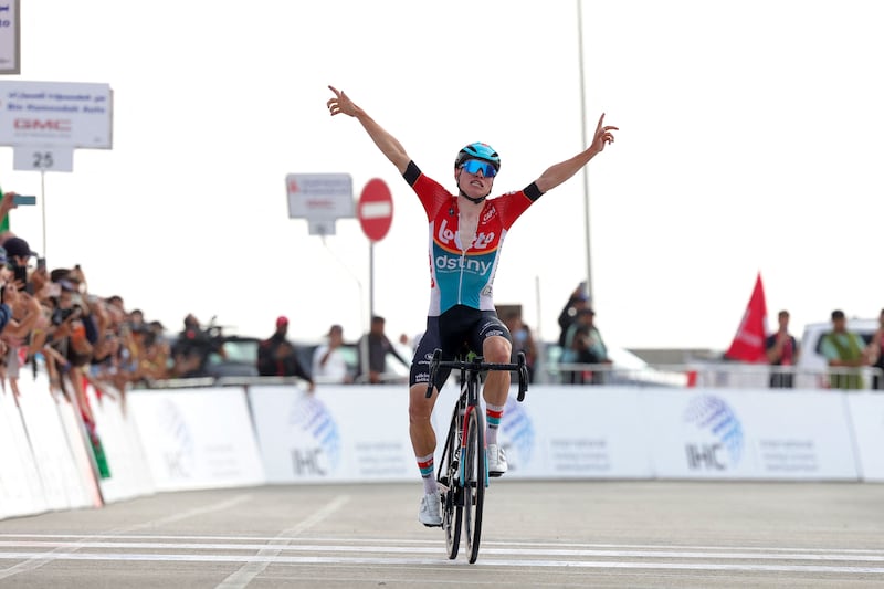 Lotto-DSTNY's Lennert Van Eetvelt reacts after winning the 7th and final stage of the UAE Tour to claim overall victory. AFP