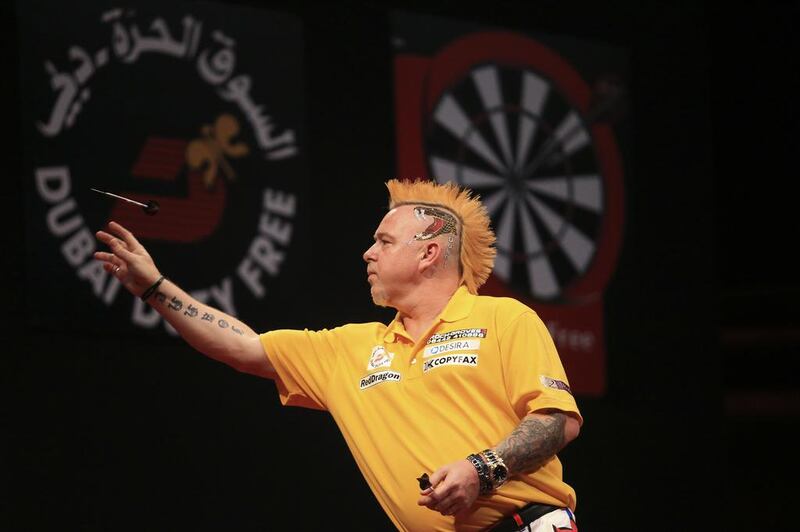 Peter Wright apologised to the Dubai crowd for lack of entertainment during his win over Phil Taylor on Thursday. Sarah Dea / The National