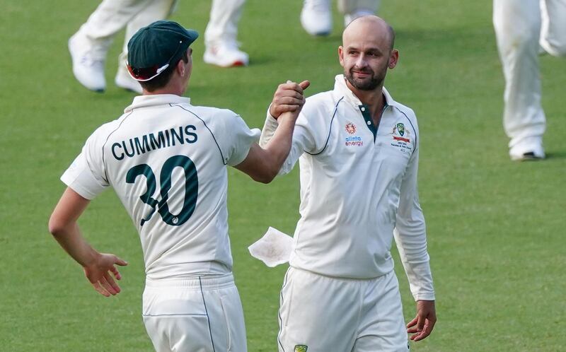 epa08038859 Nathan Lyon of Australia (R) celebrates with Pat Cummins after taking his fifth wicket during day 4 of the second Test Match between Australia and Pakistan at the Adelaide Oval in Adelaide, South Australia, Australia, 02 December 2019. Australia beat Pakistan by innings and 48 runs in the second Test.  EPA/SCOTT BARBOUR -- EDITORIAL USE ONLY, IMAGES TO BE USED FOR NEWS REPORTING PURPOSES ONLY, NO COMMERCIAL USE WHATSOEVER, NO USE IN BOOKS WITHOUT PRIOR WRITTEN CONSENT FROM AAP -- AUSTRALIA AND NEW ZEALAND OUT